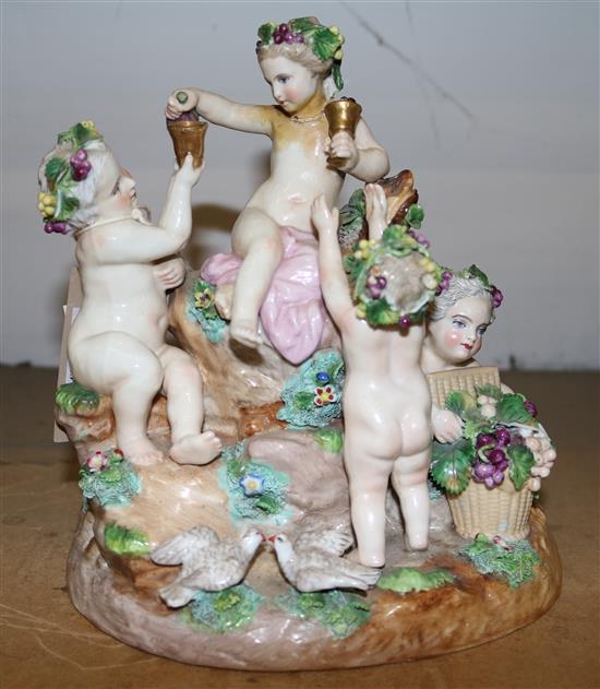 Continental porcelain group of Bacchic Putti (restored)(-)
